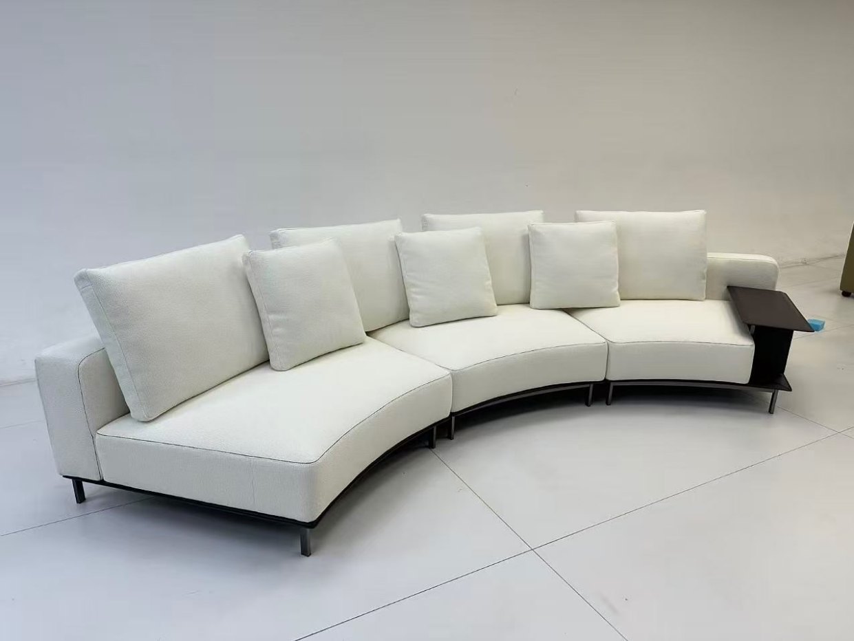 White curved sofa from the supplied sample photos